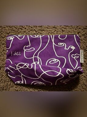 Elizabeth Arden Purple Cosmetic Pouch with White Line Design